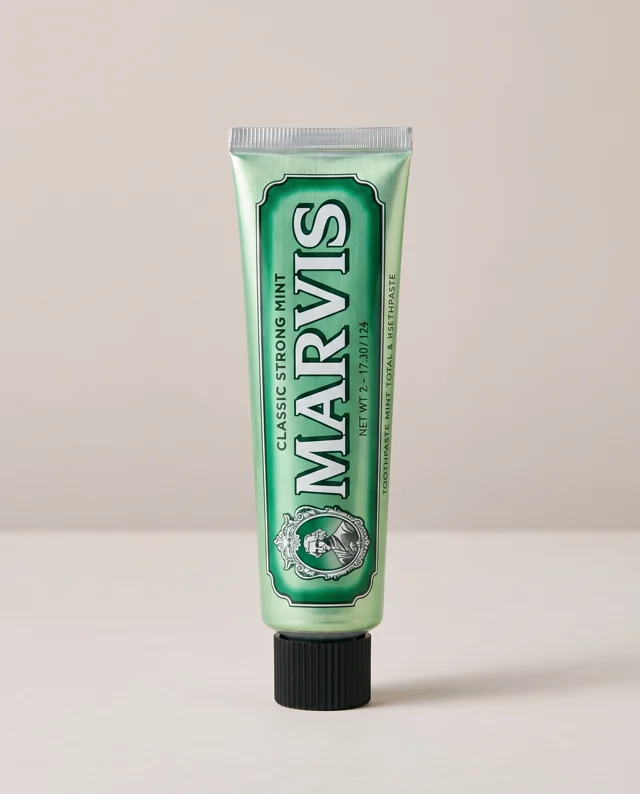 Recreated neutral product reference of a closed green Marvis Classic Strong Mint toothpaste tube